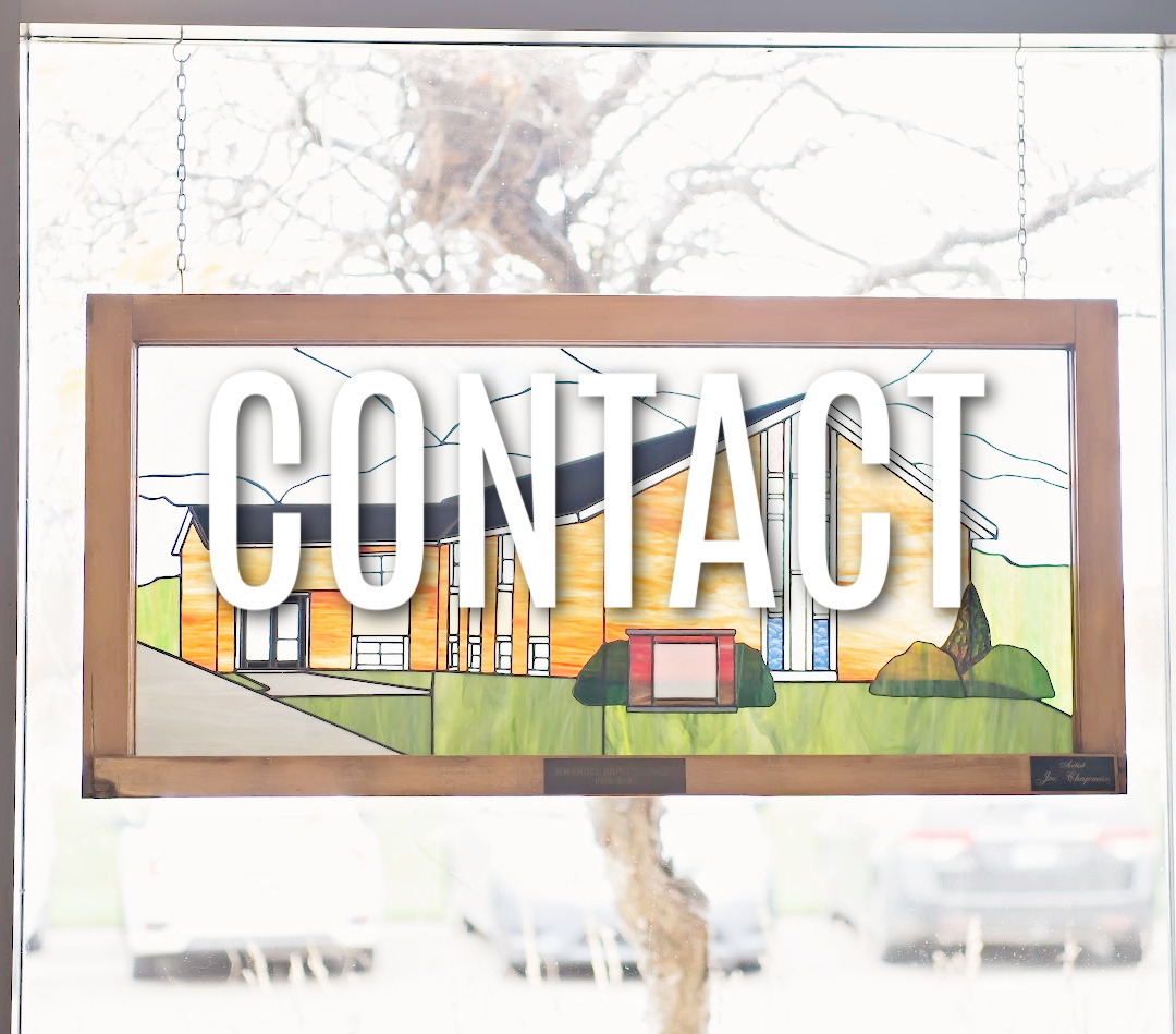 stained glass window church white lettering