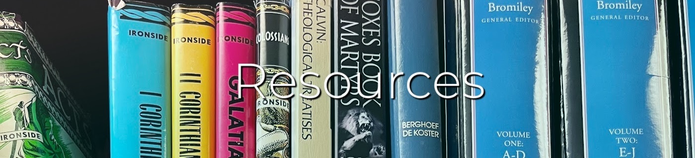 books on a shelf, white lettering